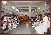 Swamishri takes a round of the newly built kitchen 