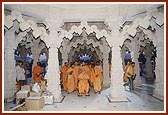 Swamishri observes the mandir and Shri Harikrishna Maharaj placed in the sinhasan of central shrine