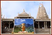 Shri Harikrishna Maharaj and BAPS Shri Swaminarayan Mandir, Junagadh in the background