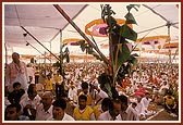 Devotees participating in the yagna rituals