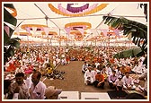 Devotees participating in the yagna rituals