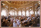 Leading devotees participating in the murti-pratishtha rituals held beneath the main dome 