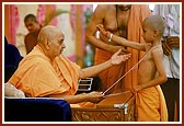 Swamishri gives janoi to brahmin boys