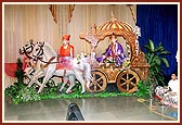 Bhagwan Swaminarayan and Gunatitanand Swami in a decorated rath
