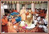 Swamishri engaged in the murti-pratishtha rituals
