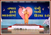 A traditional dance performance by youths, 'Tamara hraday akashma pankhi bani udya karu...'