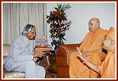 The President engaged in spiritual discussion with Swamishri