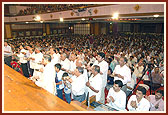 Devotees perform arti