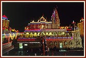 An illuminated Bochasan Mandir during mangla arti