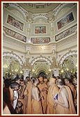 ... observes paintings of Bhagwan Swaminarayan and Shastriji Maharaj placed in the mandir dome