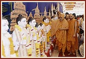 Swamishri performs puja of Shri Ghanshyam Maharaj, Shri Ganeshji, Shri Hanumanji and other 11 new hari mandirs