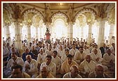 Devotees participating in the murti-pratishtha rituals