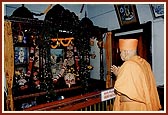 Swamishri engaged in darshan of Thakorji at the birthplace