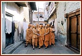 Swamishri going towards a sacred shrine