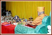 Swamishri performs the various rituals of Chopada pujan