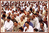 Devotees in the assembly