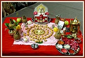 Thakorji in Mahapuja with symbolic representation of deities and muktas