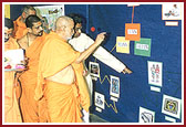 Swamishri viewing the exhibitions prepared by Kishores and Kishoris 